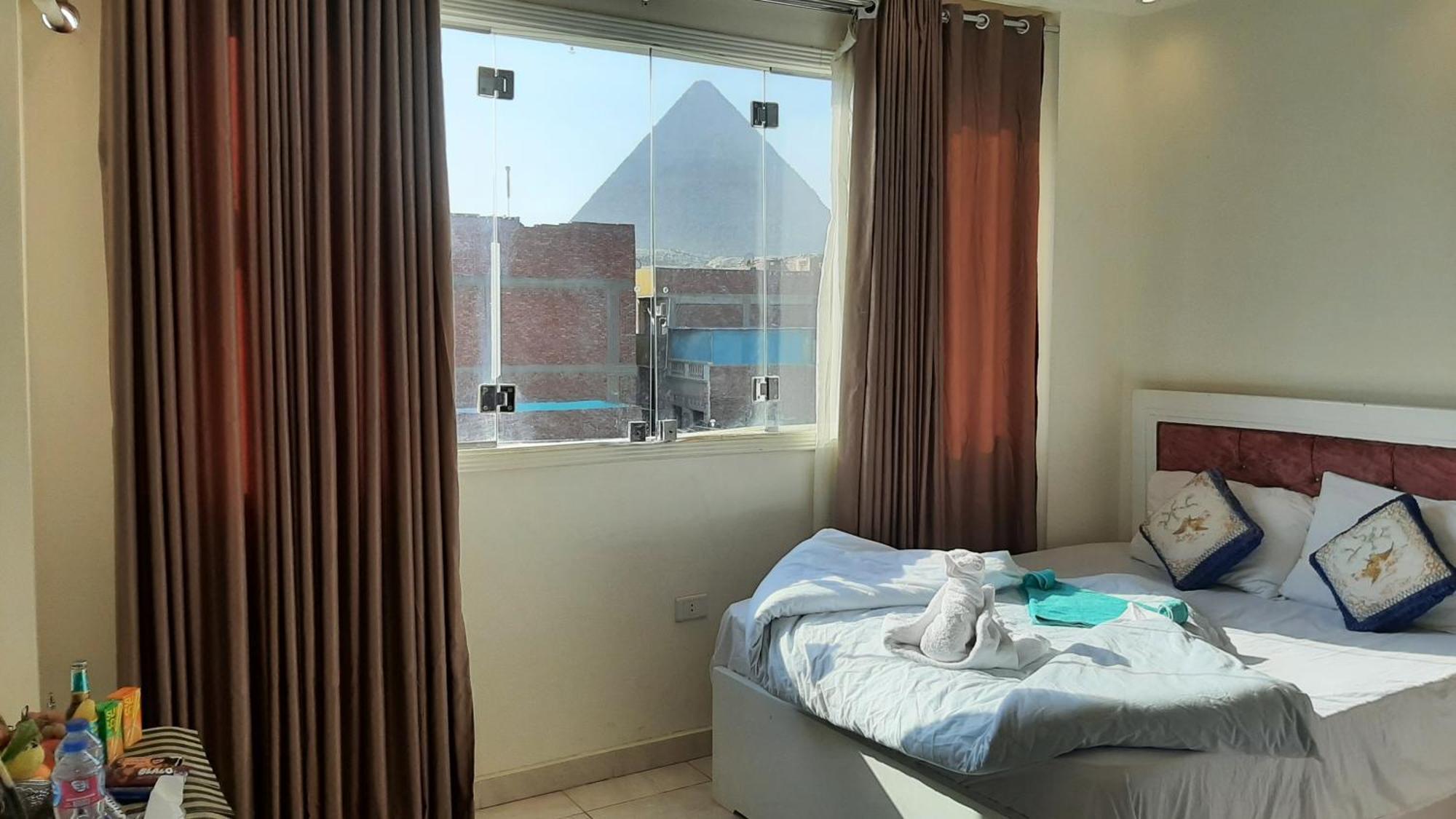 Queen Isis Pyramids View Al Kawm al Akhdar Ngoại thất bức ảnh